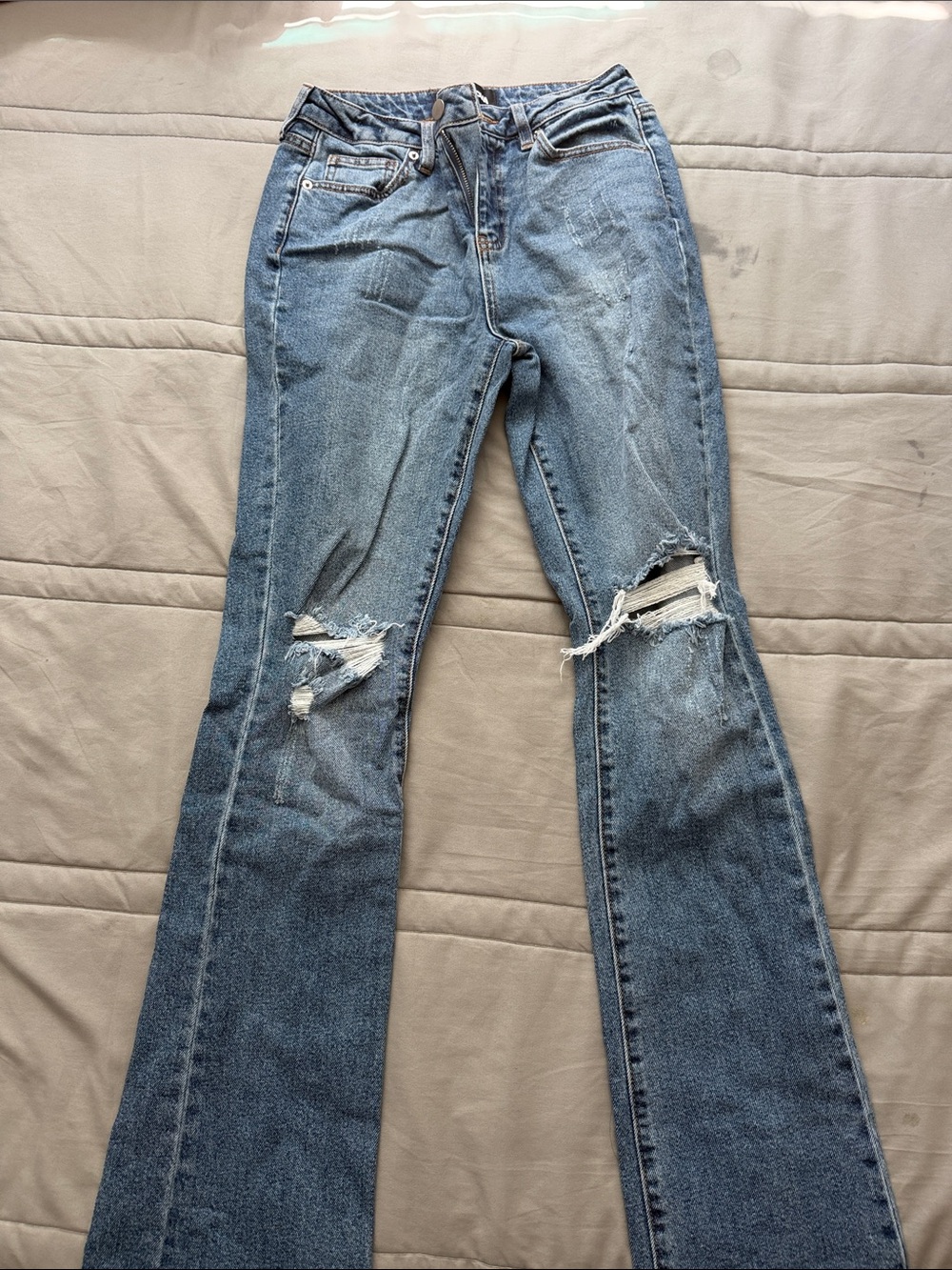 Women’s Distressed Blue Flared Jeans